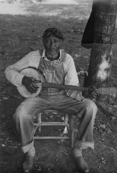 Banjo player at a Madison College campout
