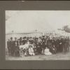 William Simpson with a group of people in front of a gospel meeting tent in Los Angeles