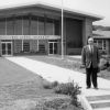 Carl Becker standing in front of Rio Lindo Academy, 1960s
