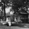 Hinsdale Sanitarium and Hospital patient and her nurse enjoying the grounds