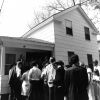 A group of students with Mervyn Maxwell outside of Ellen G. White's Wood Street home in Battle Creek, Michigan