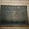 Plaque by the entrance to James White Library, Andrews University