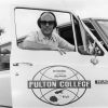 Alex Currie with Toyota Hiace commuter van for mission work at Fulton College