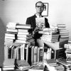 [Bill Johnson with books donated to the James White Library]