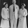 Harry Miller with two graduate nurses, Phoebe and Grace