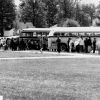 [Pathfinders loading buses for a weekend of camping by Lake Allegan]