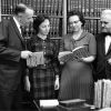 [Floyd Rittenhouse, Jamie Trefz, Mary Jane Mitchell, and Daniel Walther looking at the Martin Luther Collection acquired by the James White Library]