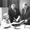 [Mary Jane Mitchell and J.G. Galusha examine copies of MIES Publications presented to the James White Library by Fred Harrsen]