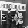 [Wilson L. Trickett hands an award to Don Prior at the Andrews University Alumni Association weekend, 1973]