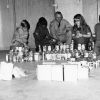 [Pathfinders from Berrien Springs, Michigan organizing food gathered during the annual Thanksgiving food drive]