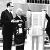 [W.G.C. Murdoch accepting a Hebrew Torah scroll from George Suhrie on behalf of the James White Library]