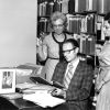 [Mary Jane Mitchell, C. Mervyn Maxwell, and Louise Dederen looking at documents in the Andrews University Heritage Room]