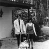 [Gene and Marie Jennings, members of the Christian band,  Ponder, Harp, and Collins,  who played at the 1972 Andrews University alumni retreat in Florida, are seen walking with their child asleep in the stroller.]