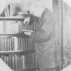 E. J. Waggoner with a portion of his library