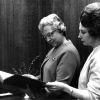 [Mary Jane Mitchell and Louise Dederen examine a rare book in the Andrews University Heritage Room]