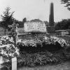 [Ellen G. White's grave site in the Oak Hill Cemetery 1915 with her casket and flowers from the funeral]