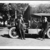 [Uriah Wilton Smith and others with a Ford Model T Touring car, probably preparing to leave on a journey]