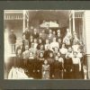 [A group of unknown people, possibly in front of one of the buildings of the Battle Creek Sanitarium]
