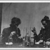 Unknown women with microscopes associated with Battle Creek College
