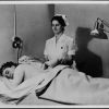 Nurse treating a patient at Stanborough Park, Watford