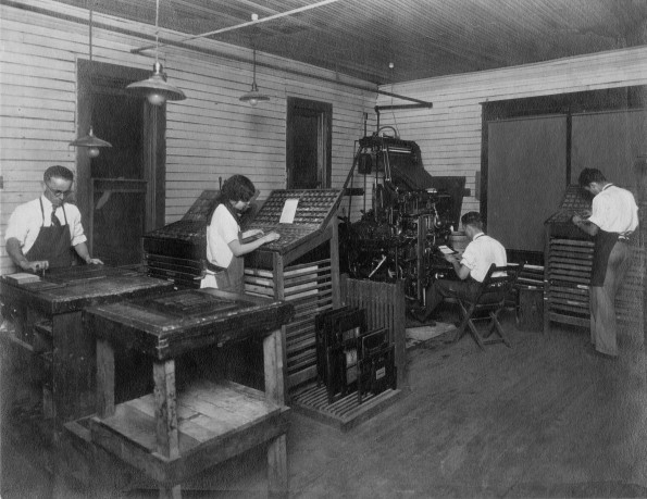 [Unknown people working in the Composing Room in Madison College's Print Shop]
