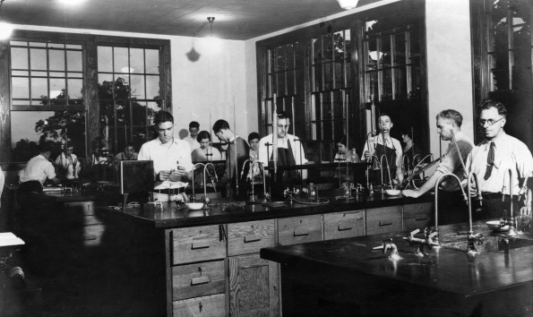 [Unknown students working in the Chemistry Lab at Madison College under the direction of professors James Rimmer and Perry Webber]
