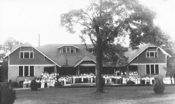 The entire student body and faculty in front of the Helen Funk Assembly Hall at Madison College