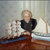 Verda Belle Spaulding with models of the HMS Bounty and native longboat, made by Floyd McCoy