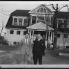 Kenneth Goodge and unknown friend in front of the Gotzian House