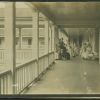 Madison Sanitarium patients and nurses on the porch of the Sanitarium