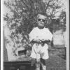 William Brunie wearing sunglasses with his wagon
