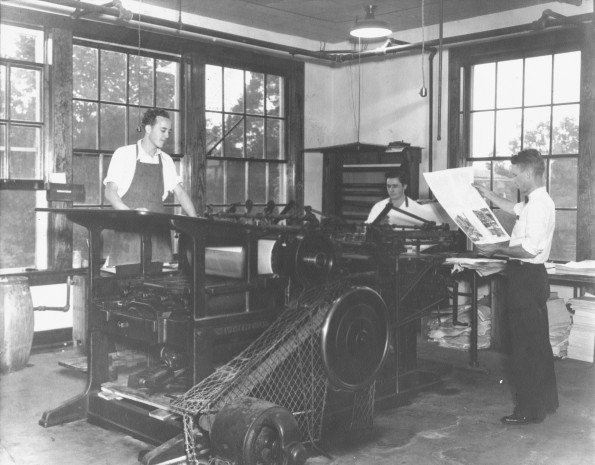 [Three unknown boys working in the Print Shop at Madison College]