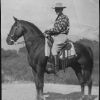 Leonard Brunie facing camera on horseback