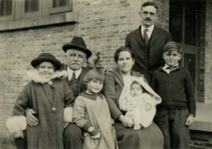 This is W. A. Spicer with his grandchildren in 1928 at Chungking, China. 