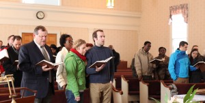 Singing early Adventist hymns in the Allegan Seventh-day Adventist church.