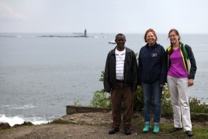 Rama Jean, Amy Moreno, and Sarah Sinz pose with one of the lighthouses in Casco Bay while visiting Fort Williams Park in Cape Elizabeth, Maine.