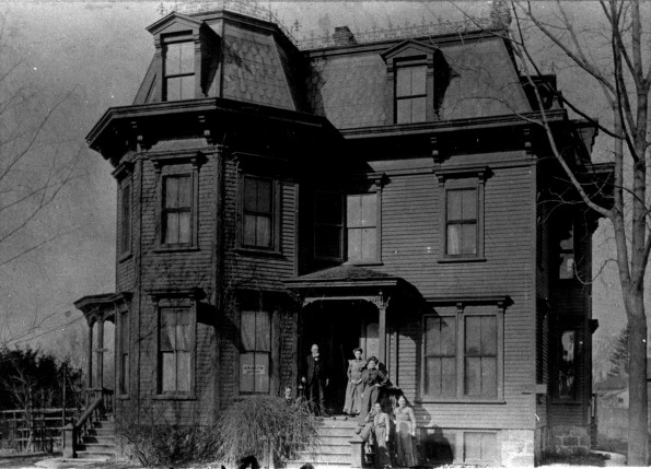 Uriah Smith, his wife, son, and Alma Caviness at his home in Battle Creek, Michigan