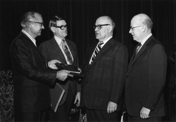 J. Paul Laurence receives an award for 25 years of outstanding service as principal of Takoma Academy in Takoma Park, Maryland