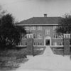 Broadview College campus view of College Hall and the entrance gate