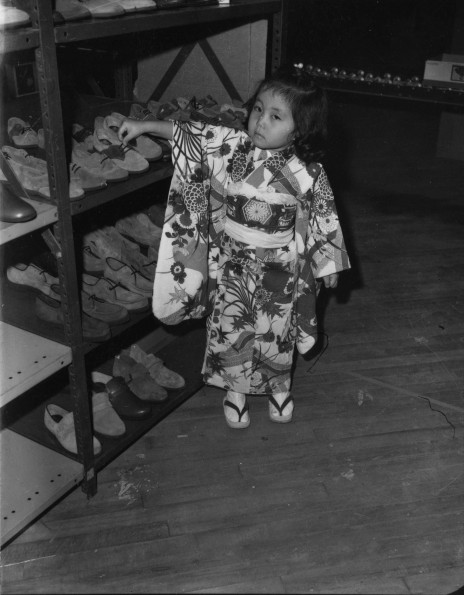 Young lady chosing new shoes at the Berrien Springs (Mich) Community Services Center