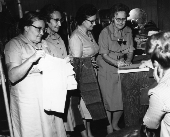 Community Service volunteers helping a family at the Berrien Springs Community Services Center (Mich.)