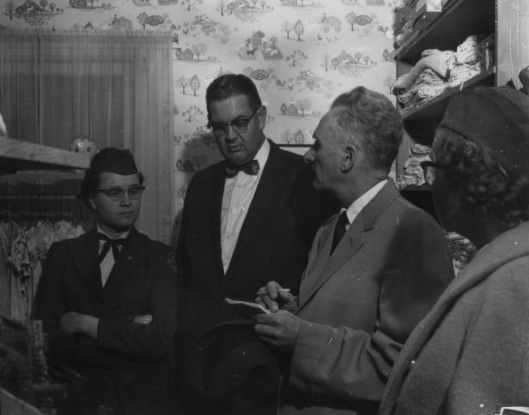 Seventh-day Adventist Community Services volunteers speak to a jounalist about their work