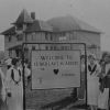 Cedar Lake Academy welcome sign, Administration Building, and students welcome you to campus, about 1925