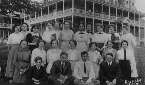 Mount Vernon Academy English 9 class, 1913-1914, with perhaps a dormitory in the background