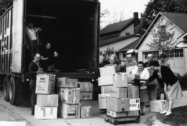 Berrien Springs Community Services Center staff weigh clothing as it is prepared to ship to New York