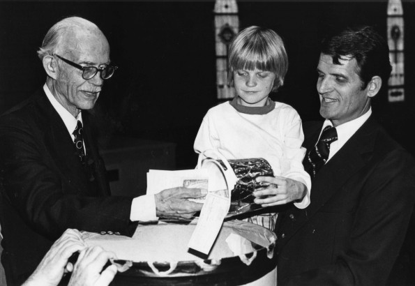 H. M. S. Richards, Sr. gathering an offering from Darryl Sturm and Chester Damron