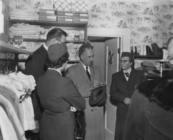 Seventh-day Adventist Community Services volunteers speak to a jounalist about their work