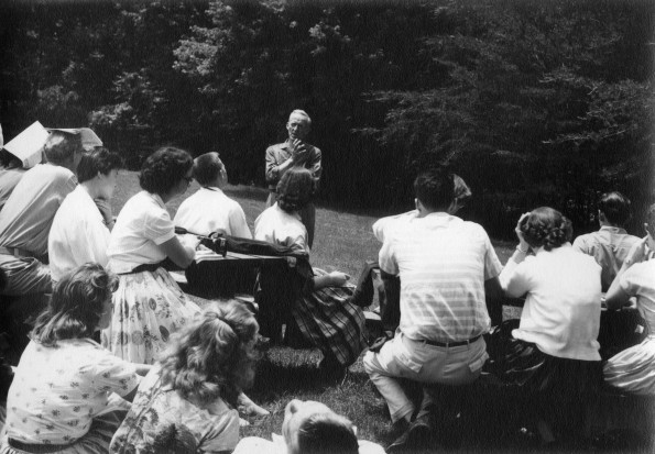 Madison College students listening to an outdoor service