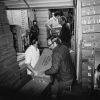 Loading cartons of clothing at the Berrien Springs Community Service Center for Adventist Research shipment to the New York warehouse