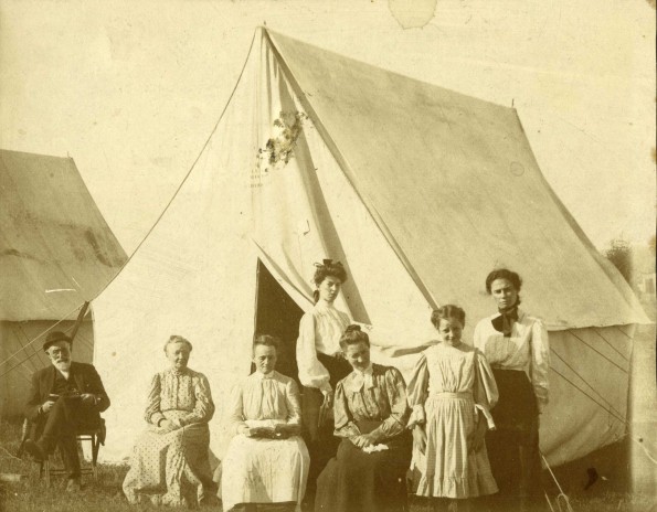 East Michigan camp meeting group outside their family tent, 1905